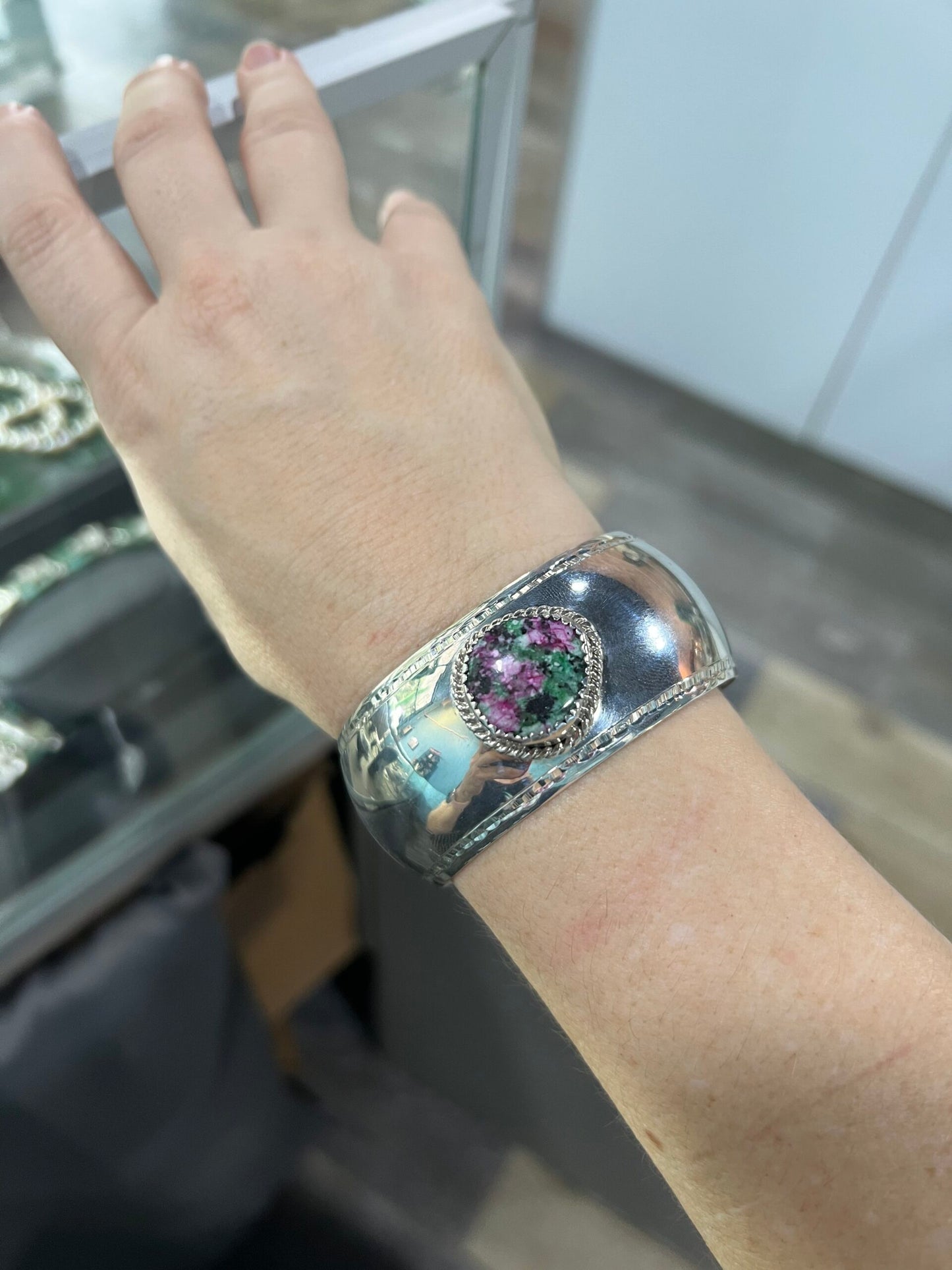 ruby in matrix sterling silver cuff bracelet on wrist