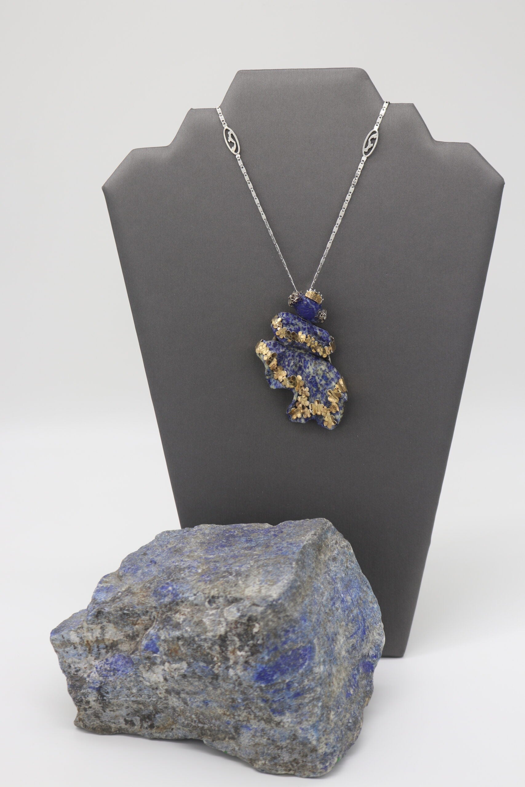 hand carved pollera dancer pendant with lapis lazuli stone
